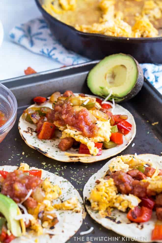 Side view of assembled chorizo and egg tacos