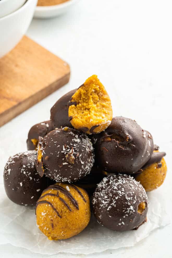 stack of pumpkin pie truffles with a bite out of it