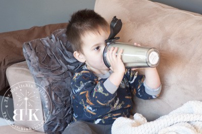 Toddler sipping out of the best Vitamix blender personal cup