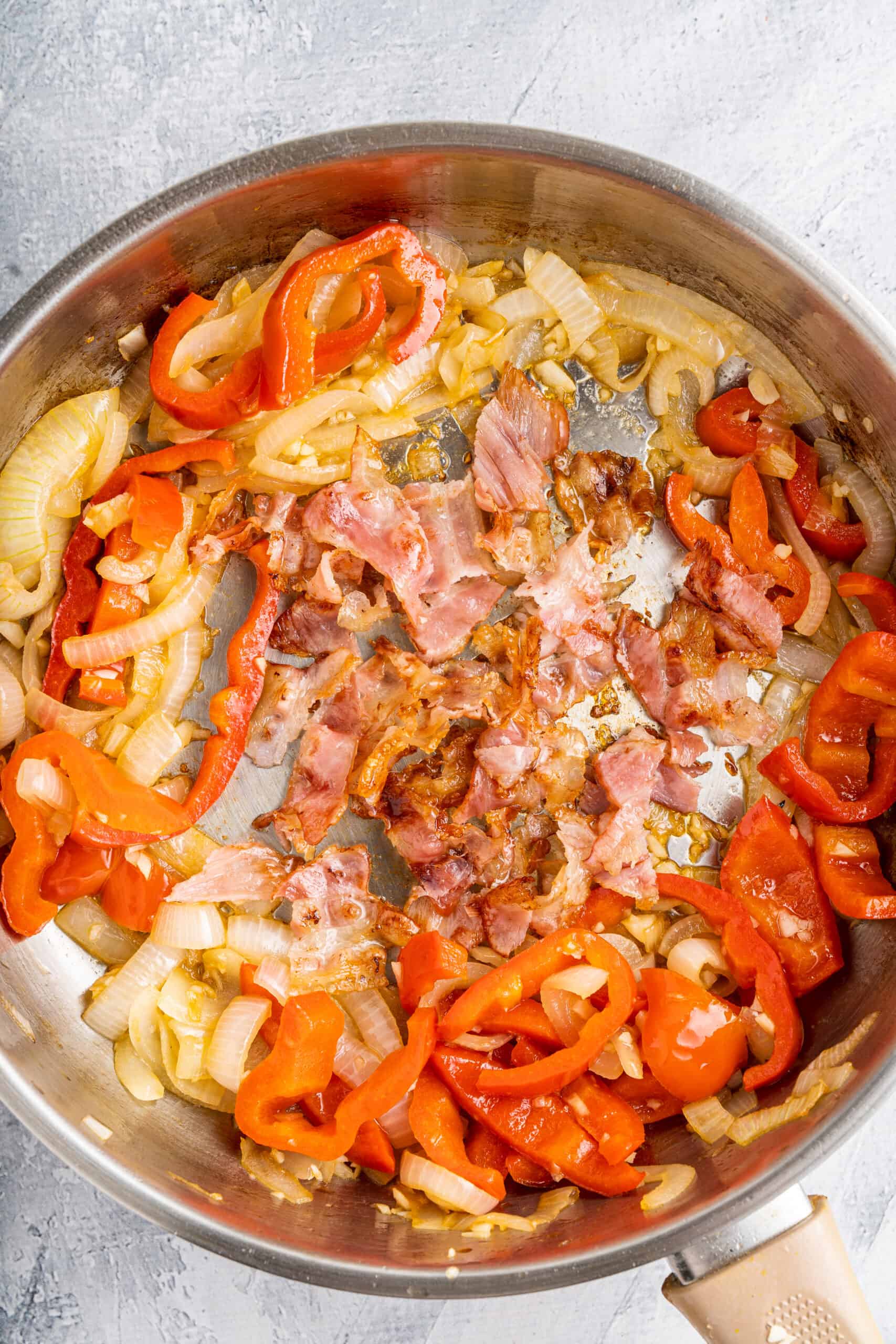 fried cabbage with bacon and onions
