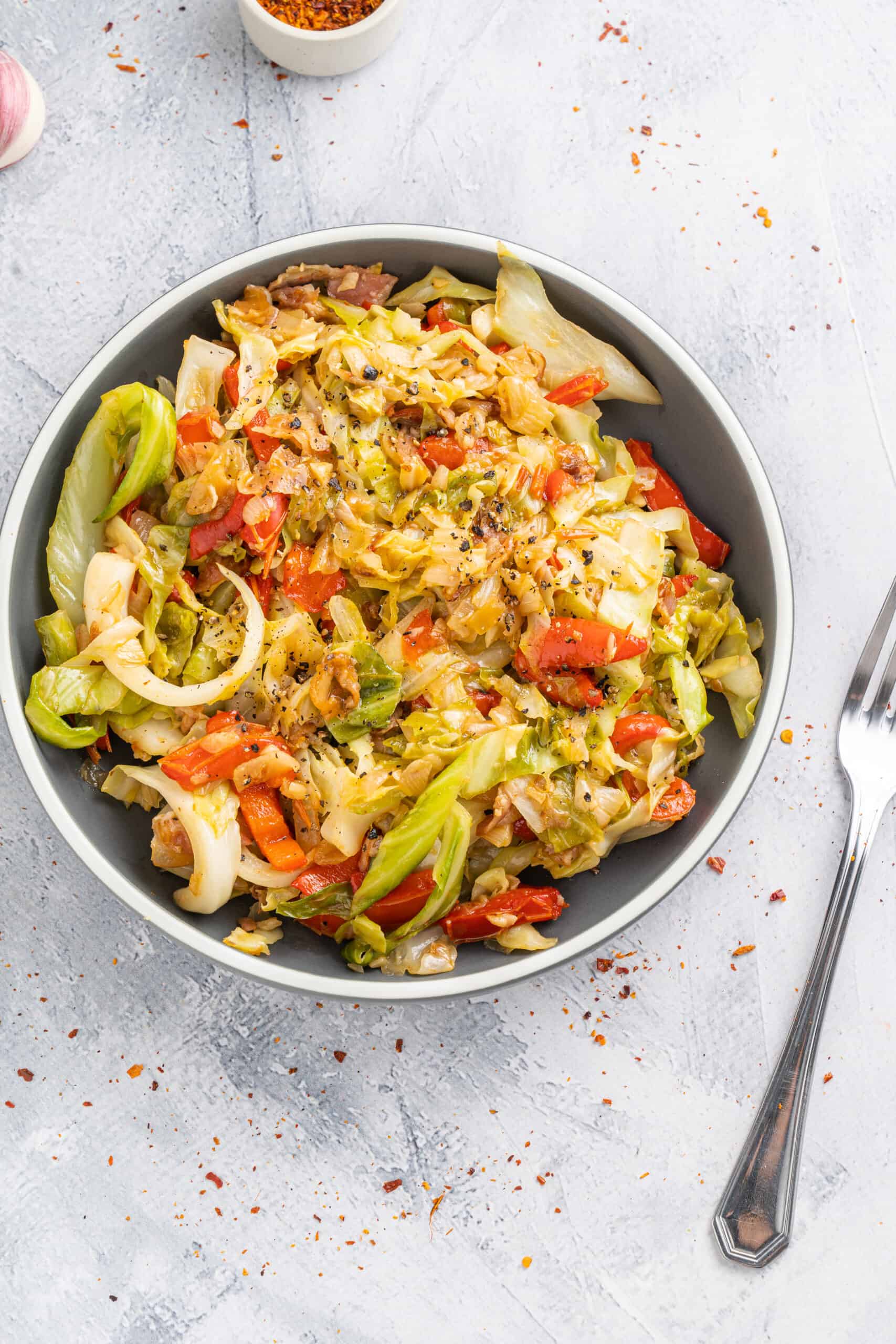 Finished Fried cabbage and bacon  in a bowl