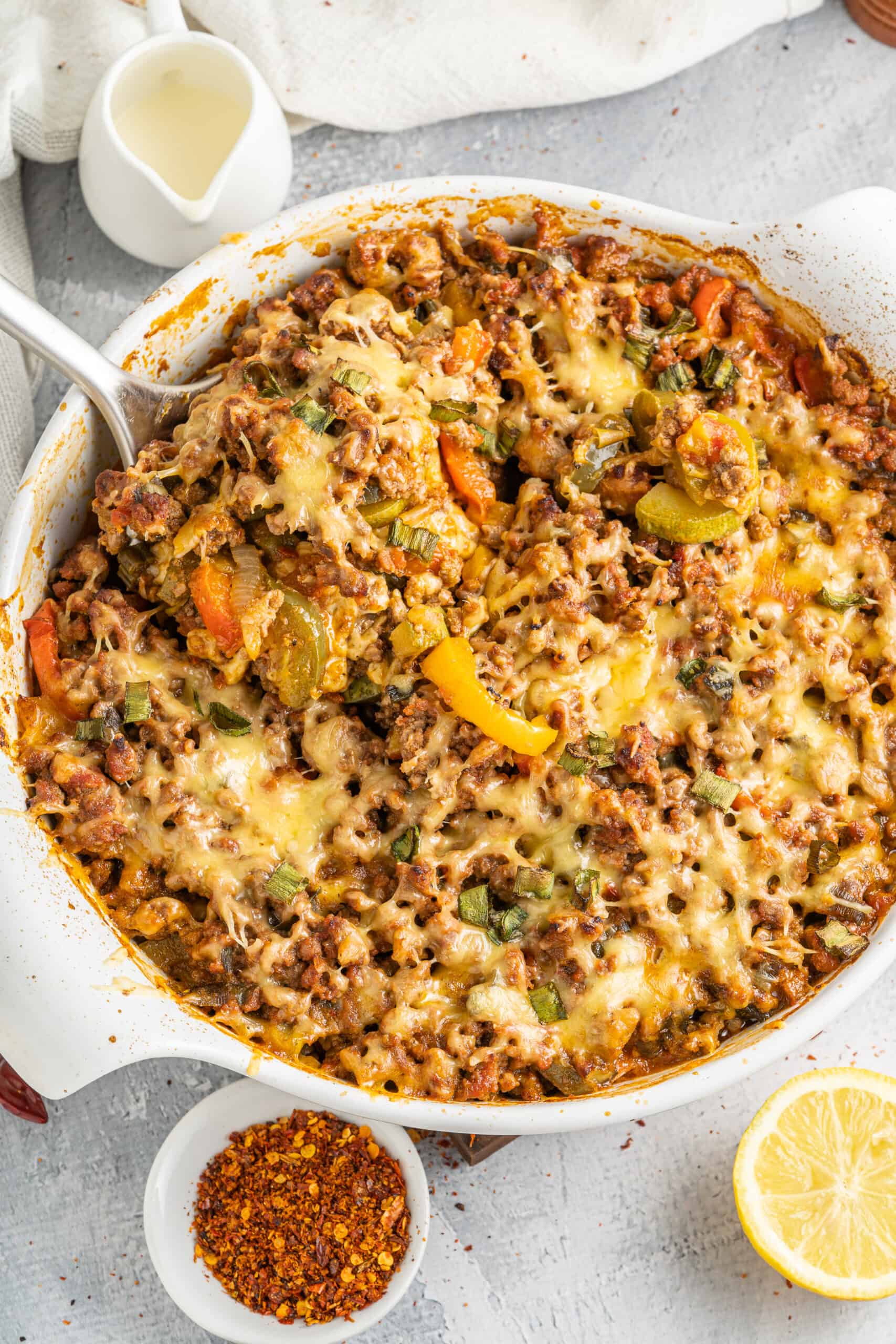 Mexican Casserole in a dish with a serving spoon