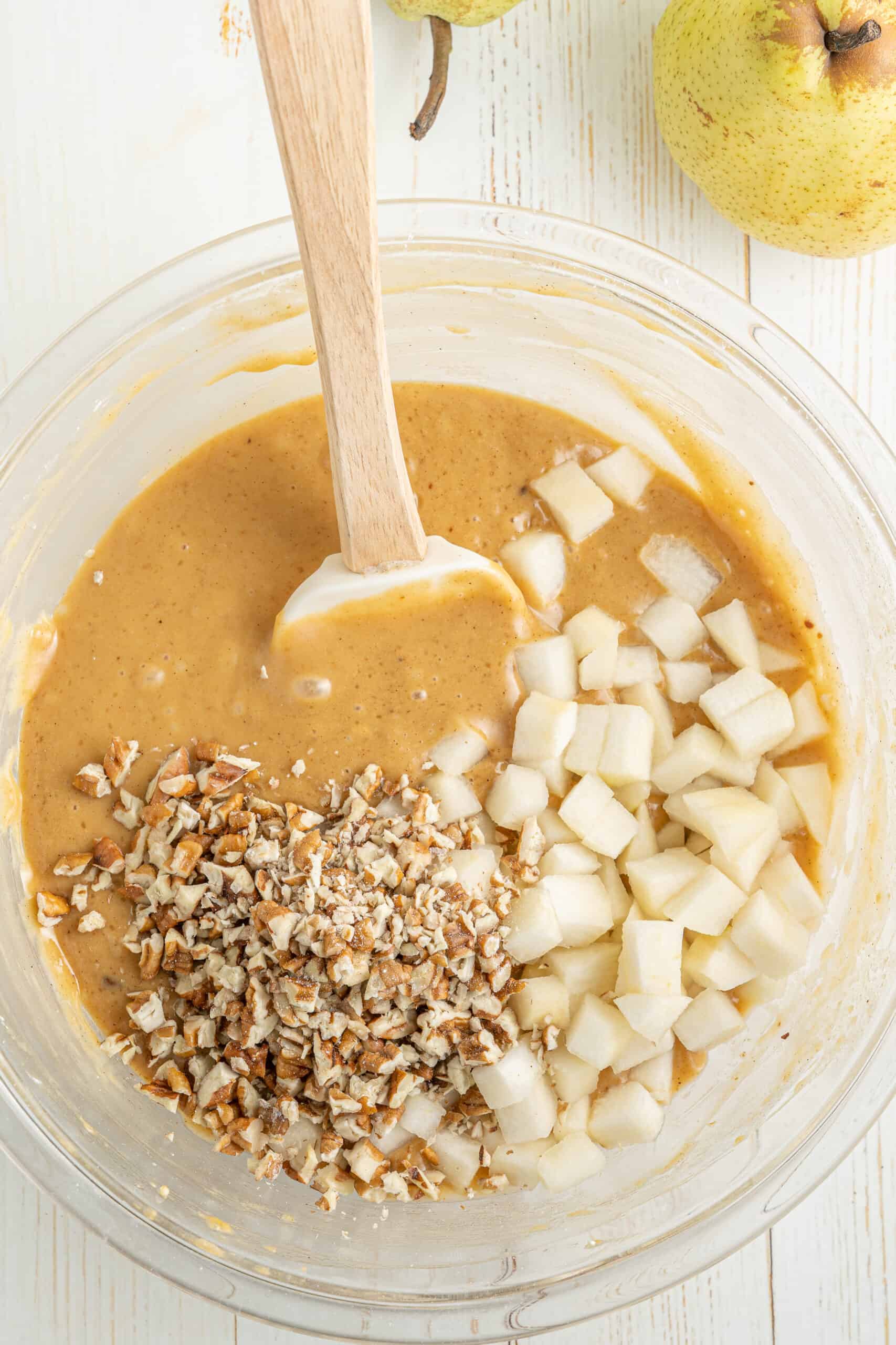 Mixing ingredients for the pear muffins recipe 