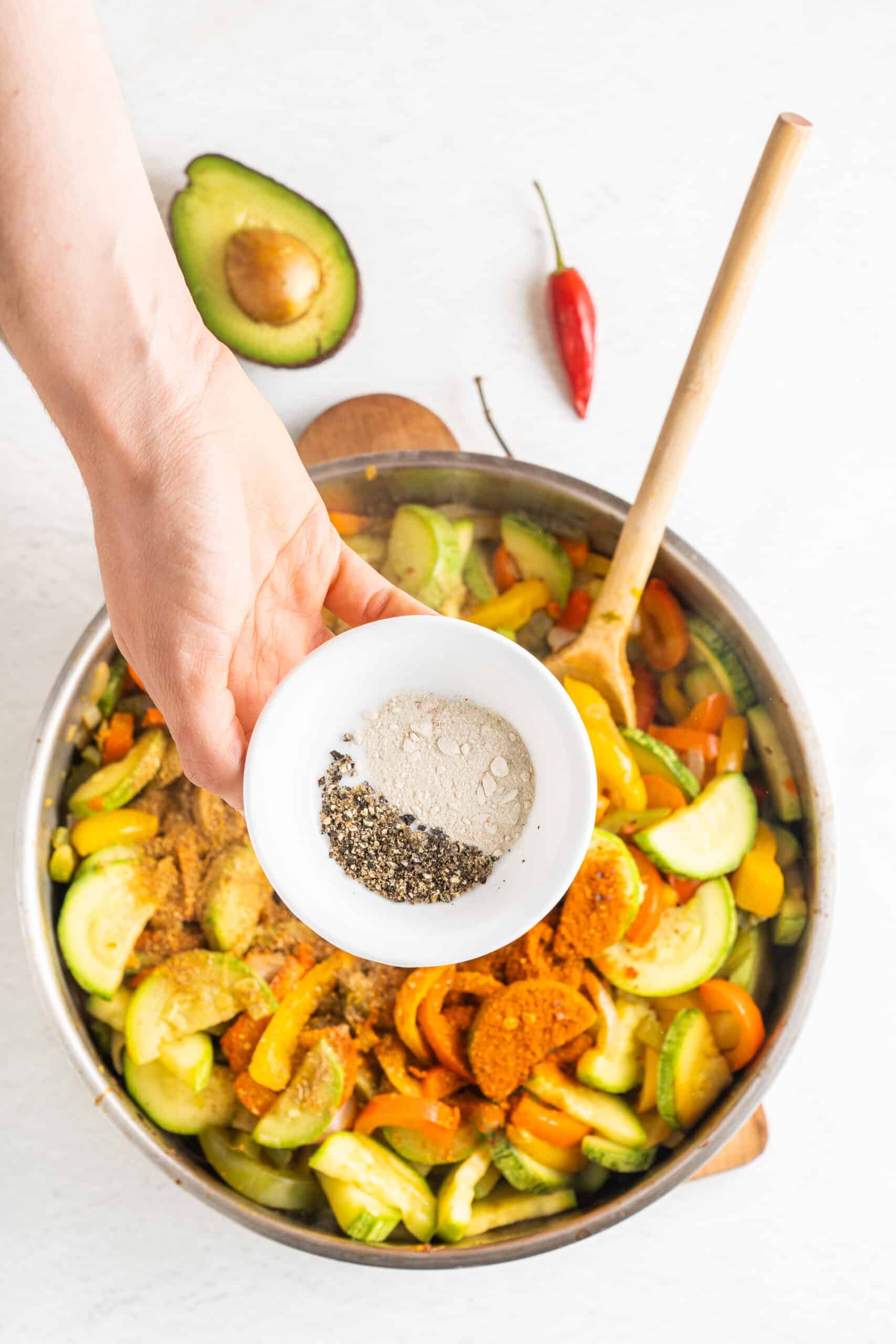 Mixing the ingredients to taco casserole 