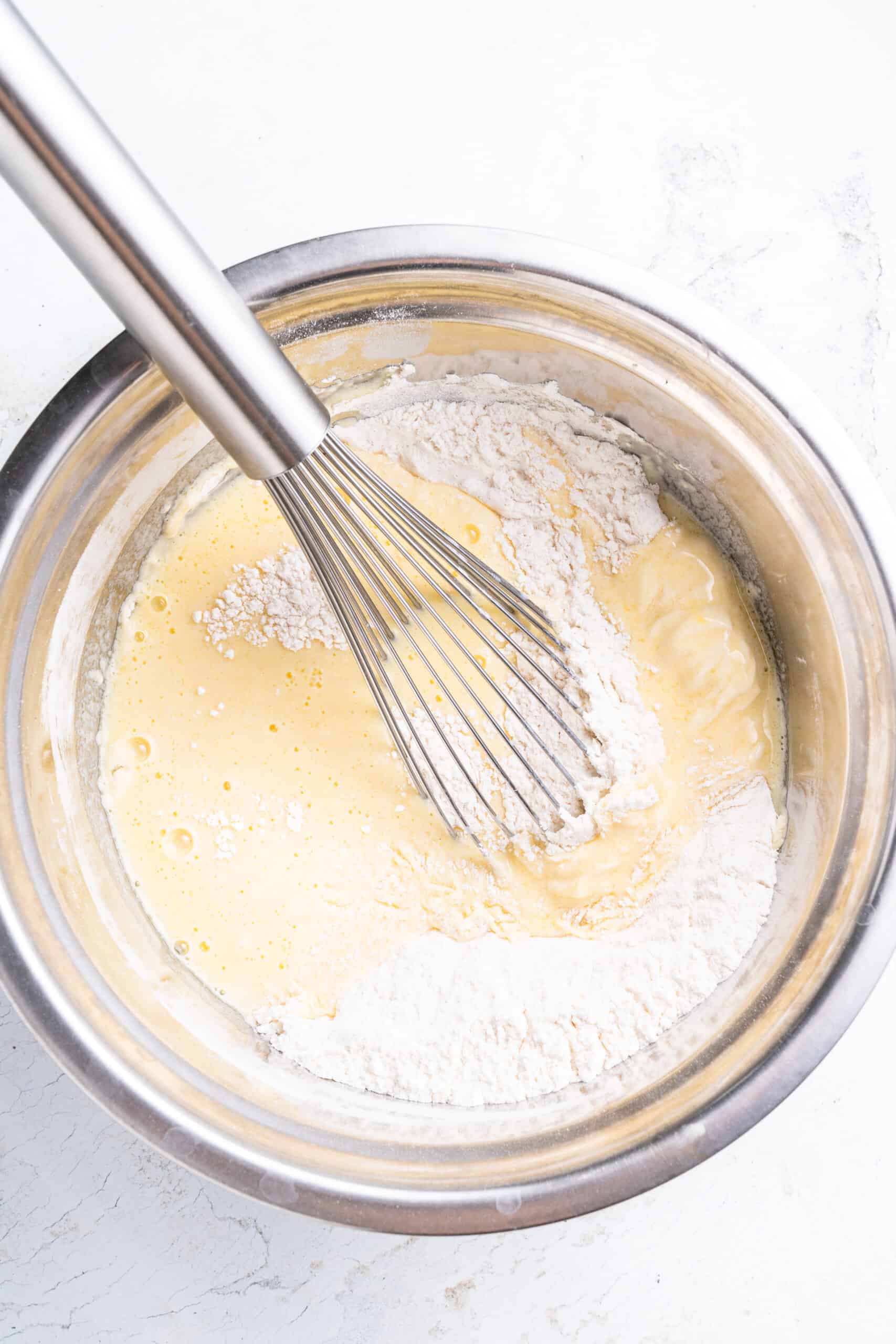 Mixing ingredients to Chocolate Chip Pancakes
