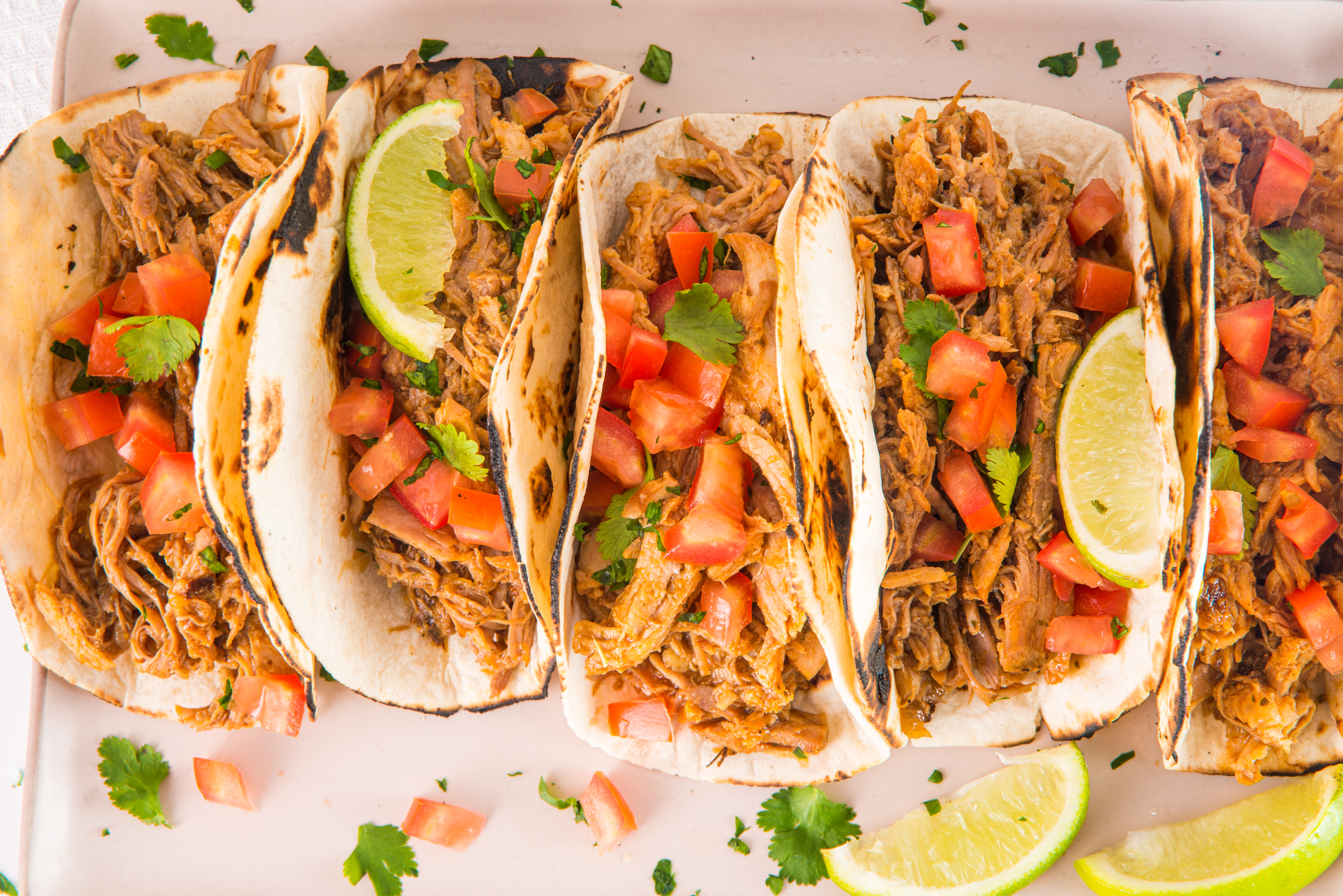 5 Pulled Pork Street Tacos on a serving plate