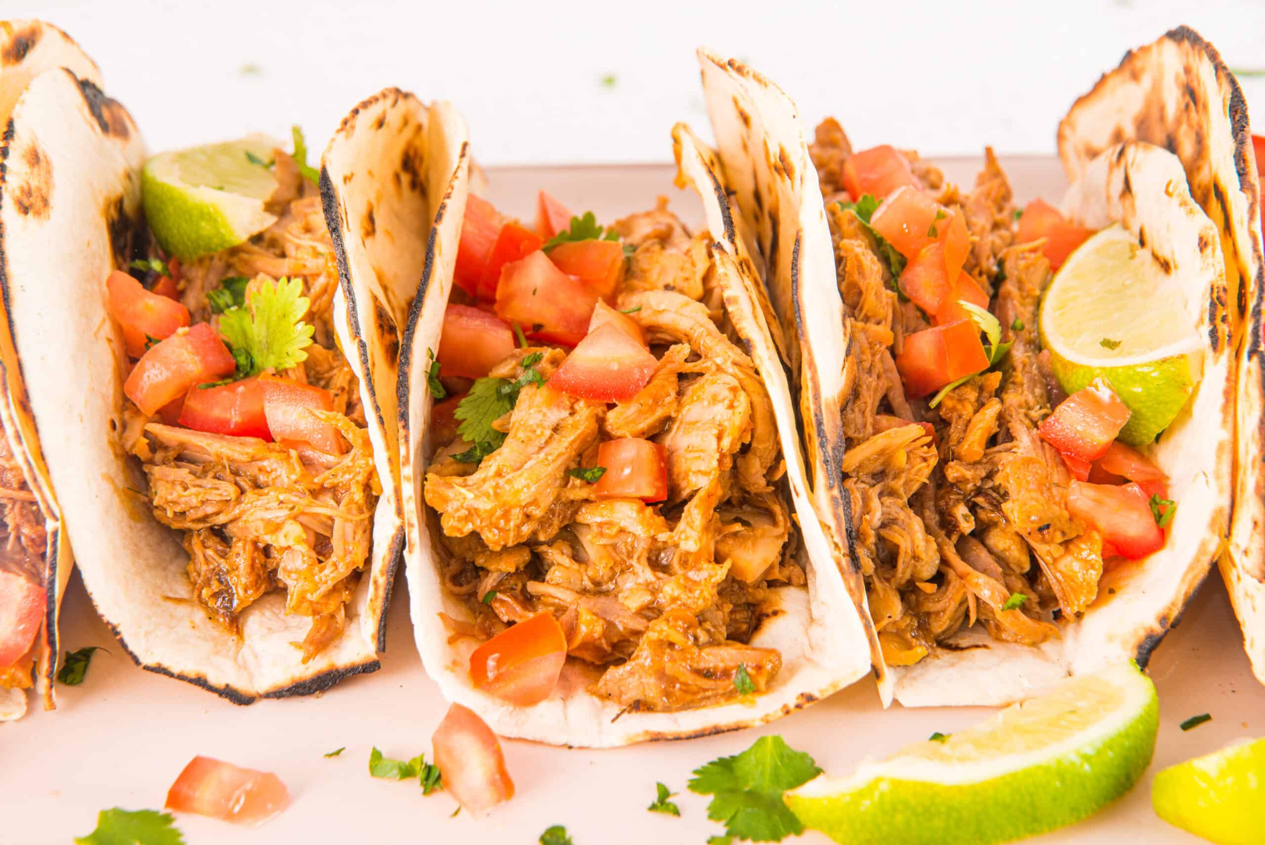 A closeup of BBQ Pulled Pork Tacos