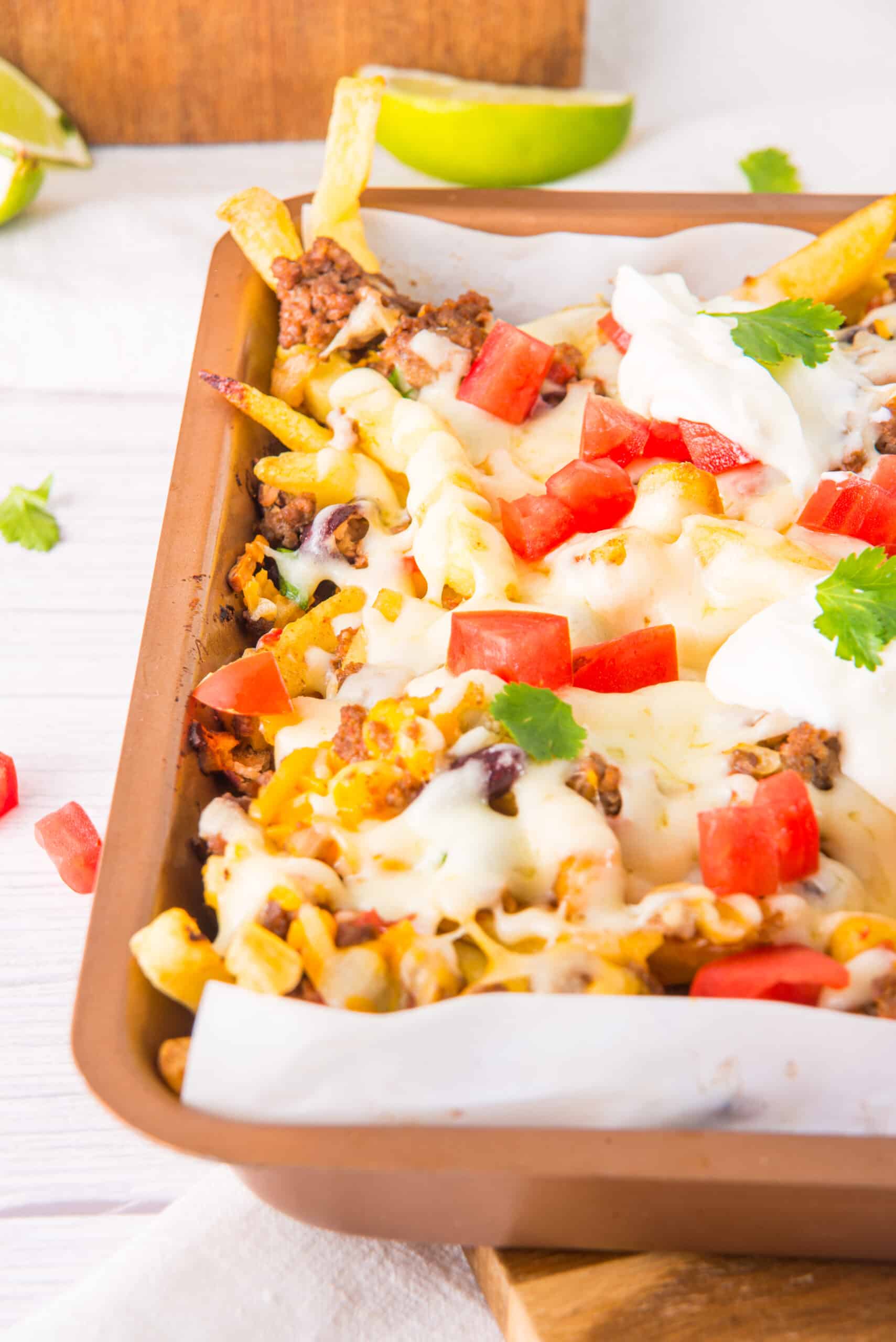 chili cheese fries in a baking dish