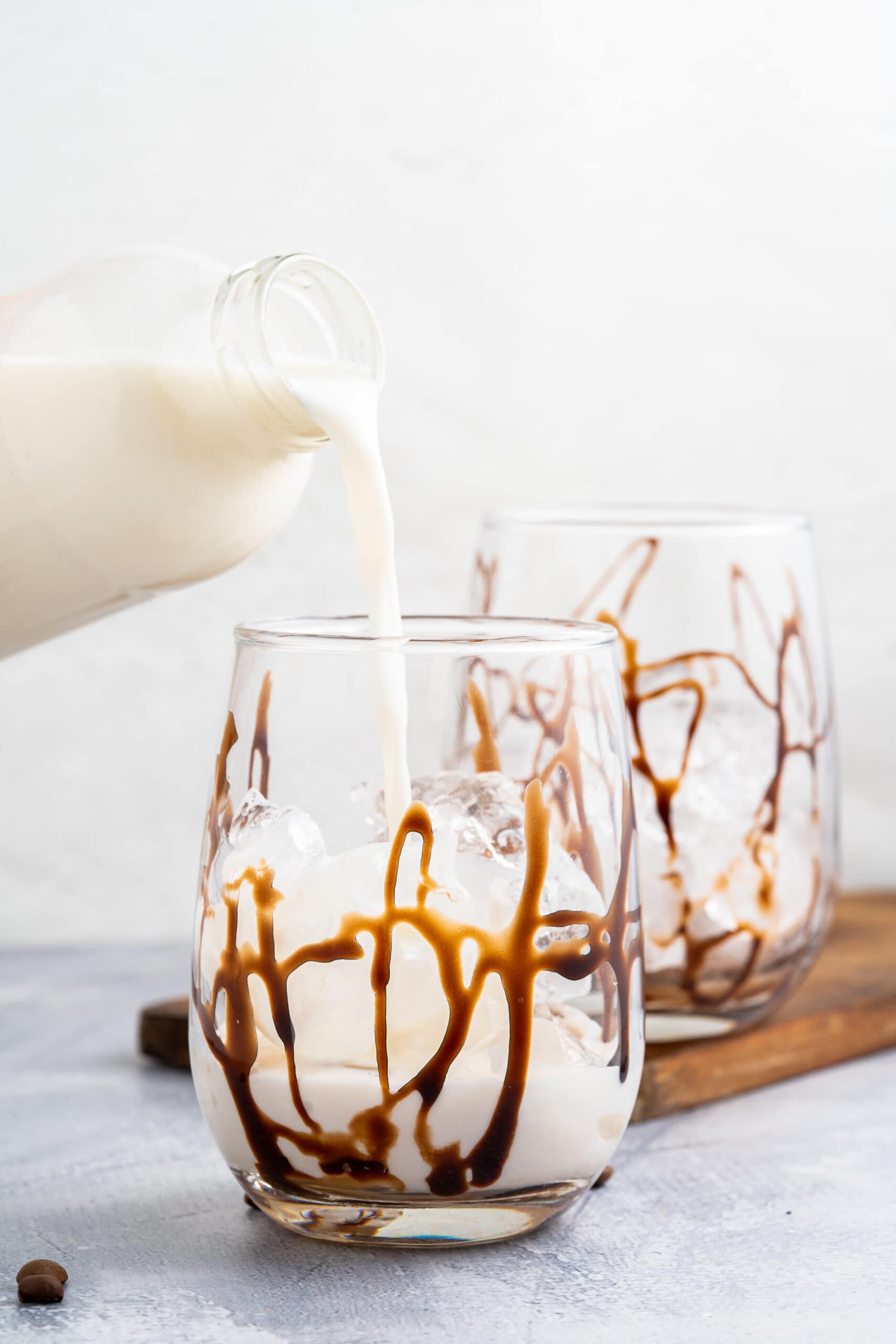 pouring milk in a Iced Mocha
