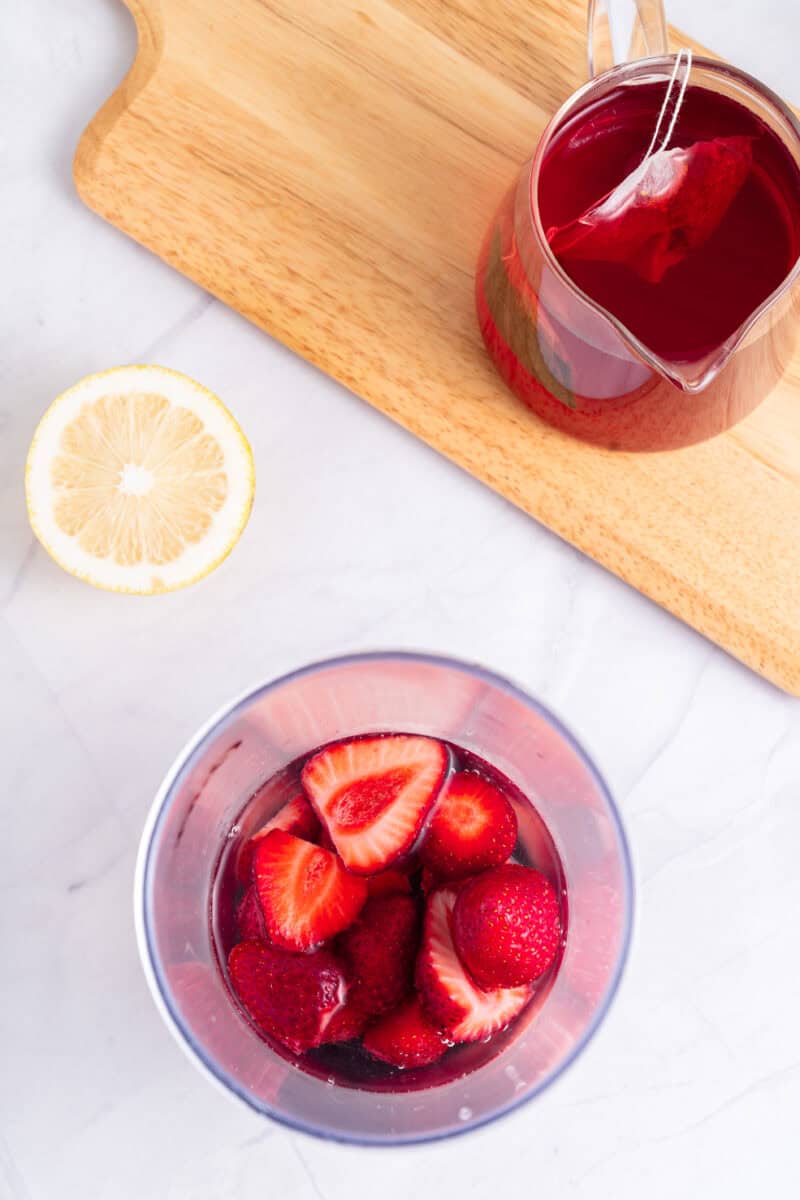 Overhead of ingredients for Strawberry Acai Starbucks Refresher
